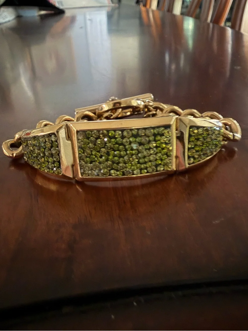 Henri Bendel Gold Tone Bracelet with Green Crystals Toggle Closure 7.5”